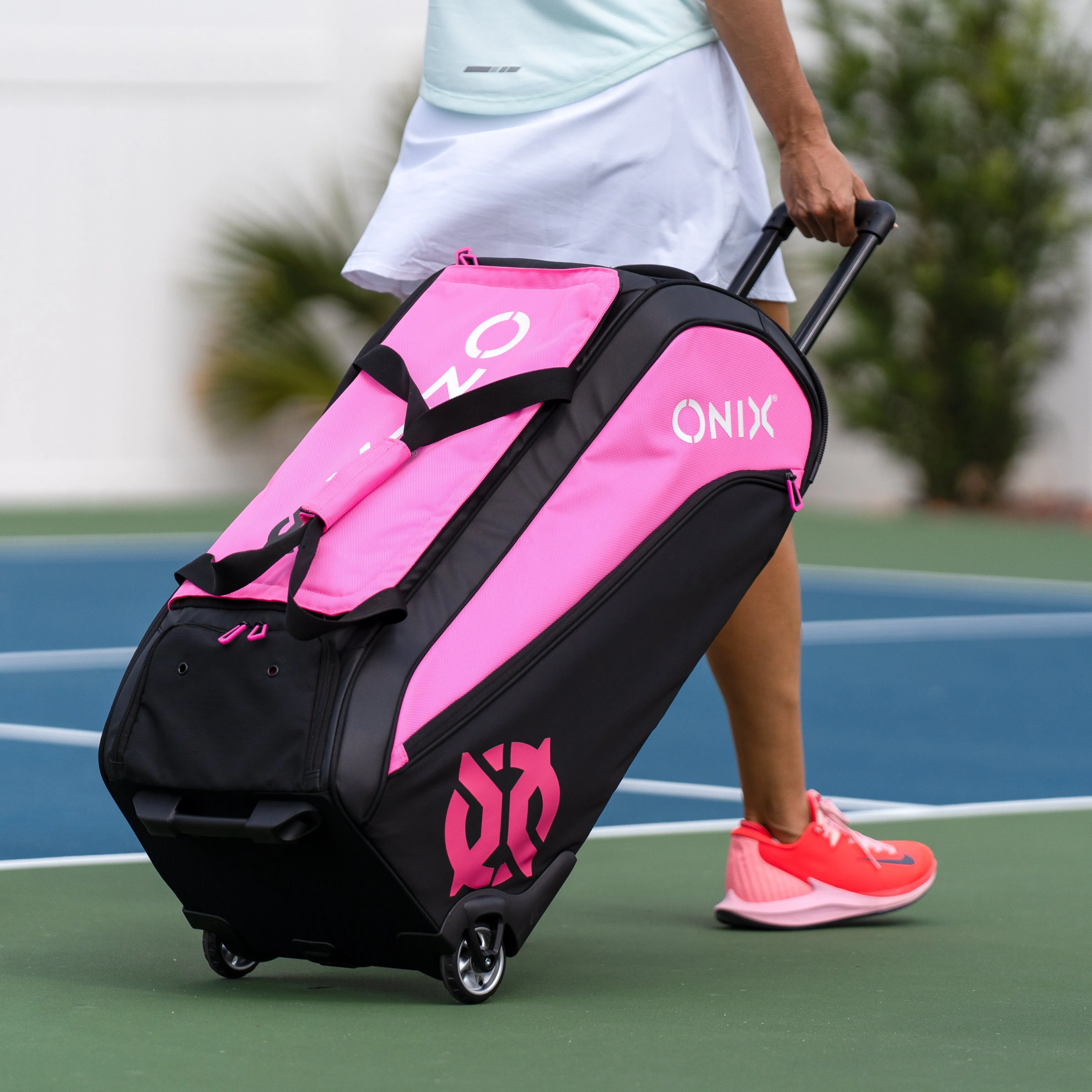 Pro Team Pink Wheeled Duffel Bag